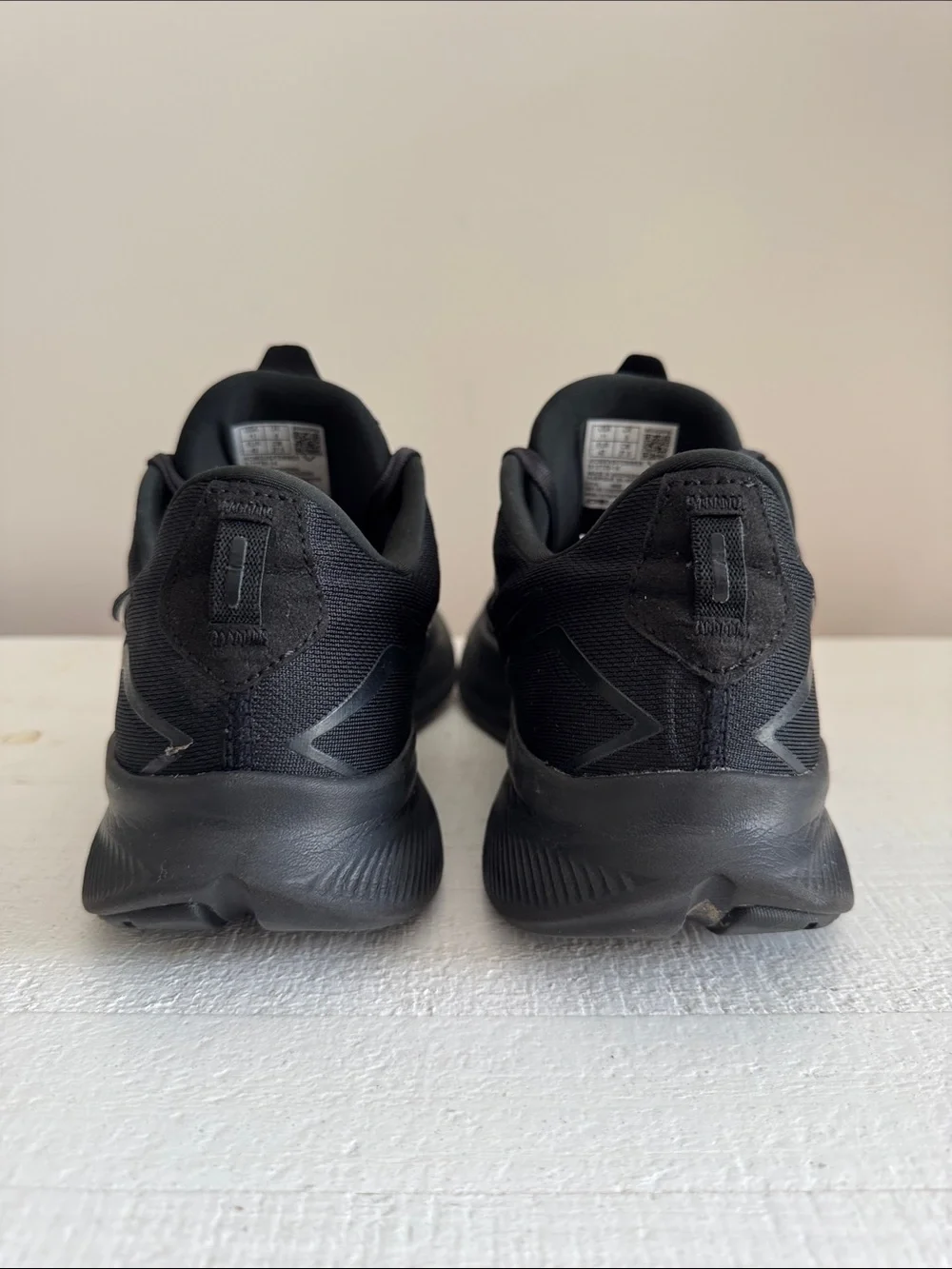 Women’s Saucony Ride 15 All-Black Running Sneakers.